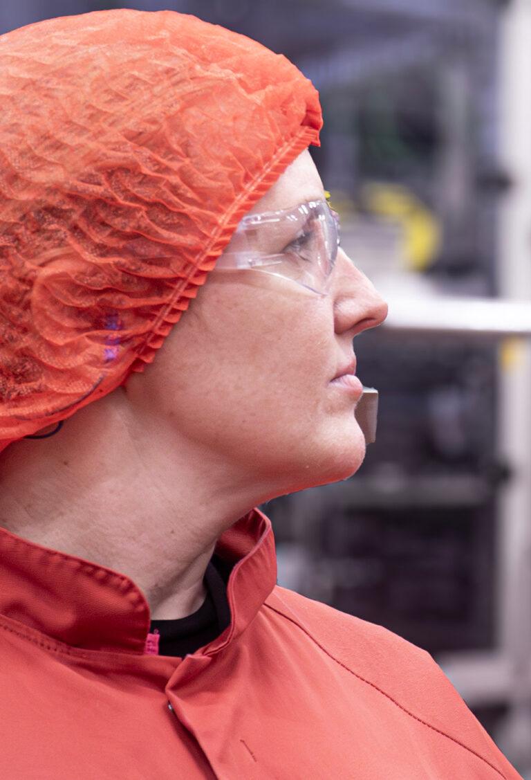 woman-wearing-red-protective-gear-close-up woman-wearing-red-protective-gear-close-up